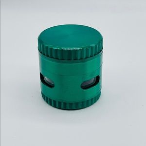Exotic green herb grinder 50mm with scrapper